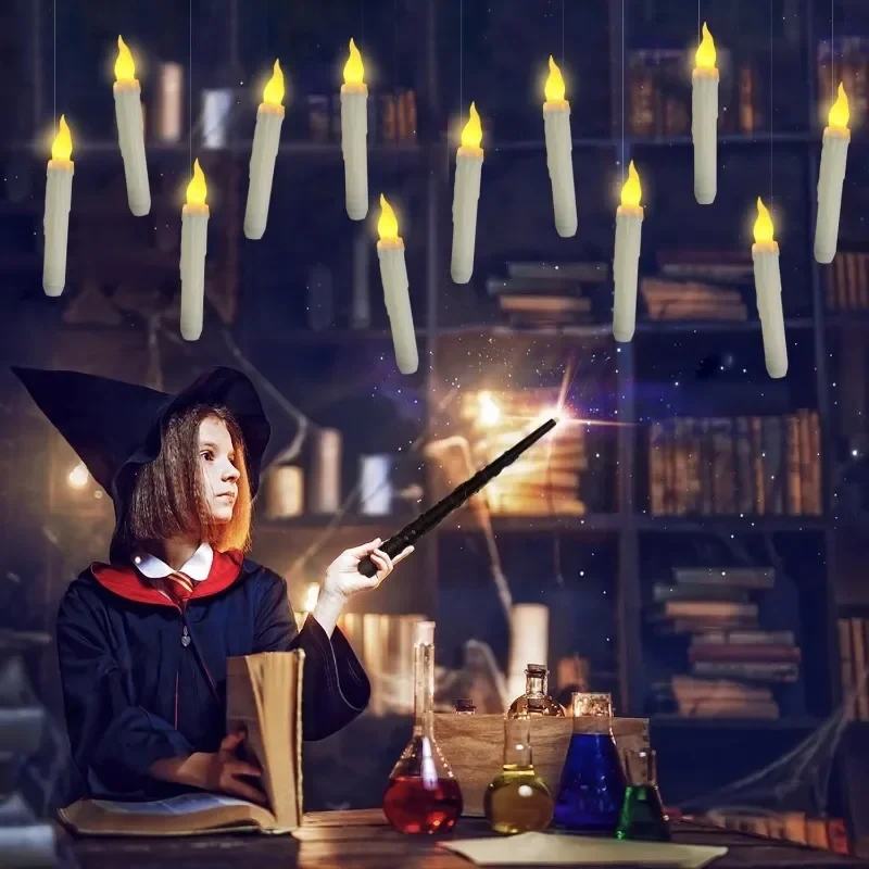 Douze bougies flottantes LED suspendues avec leur télécommande baguette